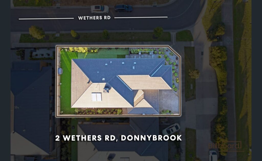 Top-down aerial view of the property at 2 Wethers Rd Donnybrook, showing the entire house roof, surrounding backyard landscaping, boundary lines and the street frontage along Wethers Rd.