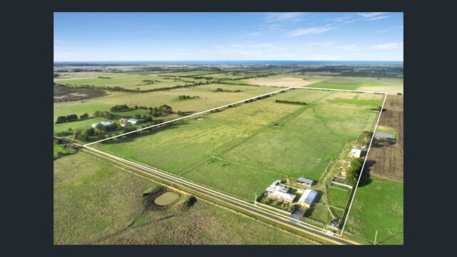 Aerial view of large rural farmland property with boundary outline showing expansive open paddocks and surrounding countryside.