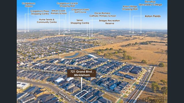 Aerial view showing residential area and streets around 721 Grand Boulevard in Mickleham, Victoria.